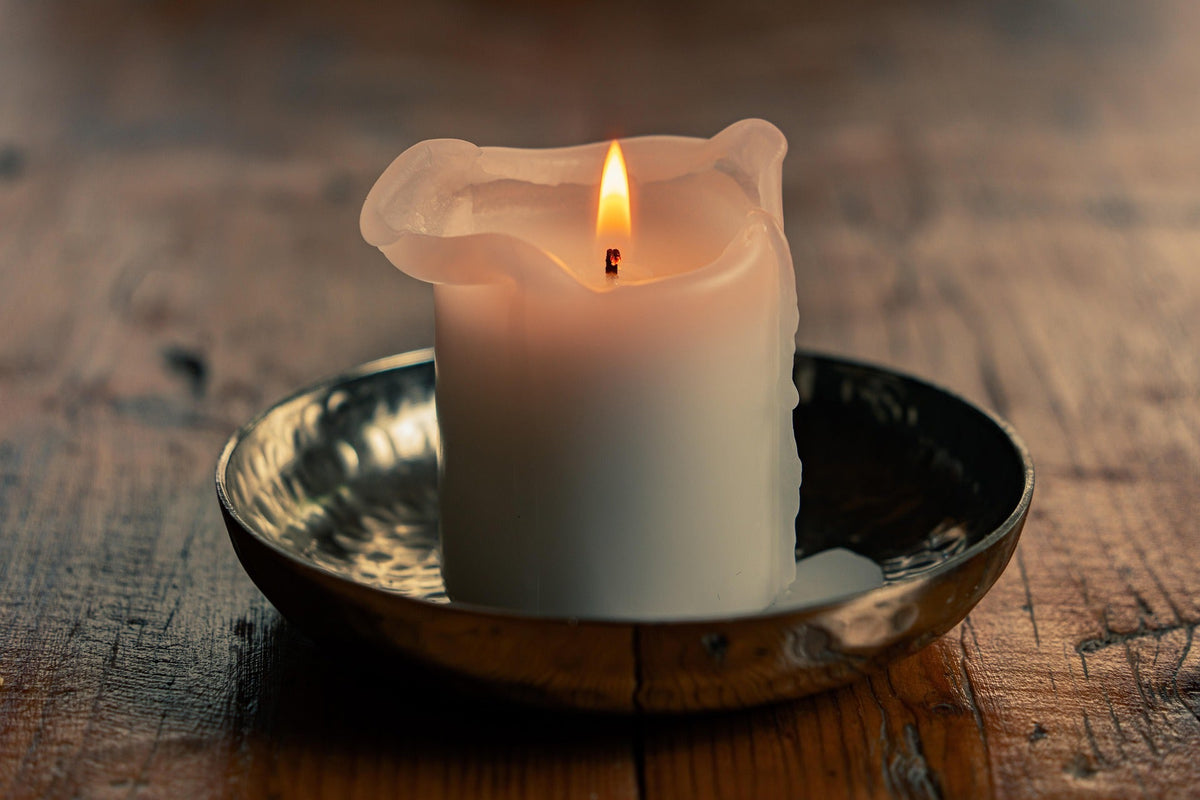Why do candles tunnel? The first burn rule